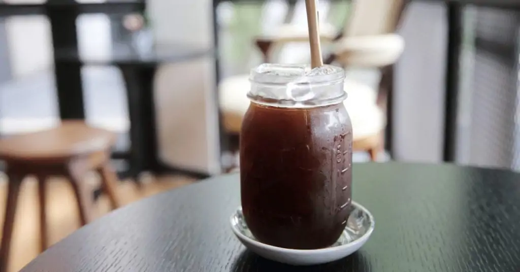 iced caffe americano in a mason jar