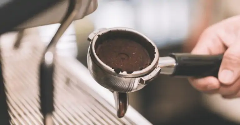 used coffee grounds in an espresso portafilter