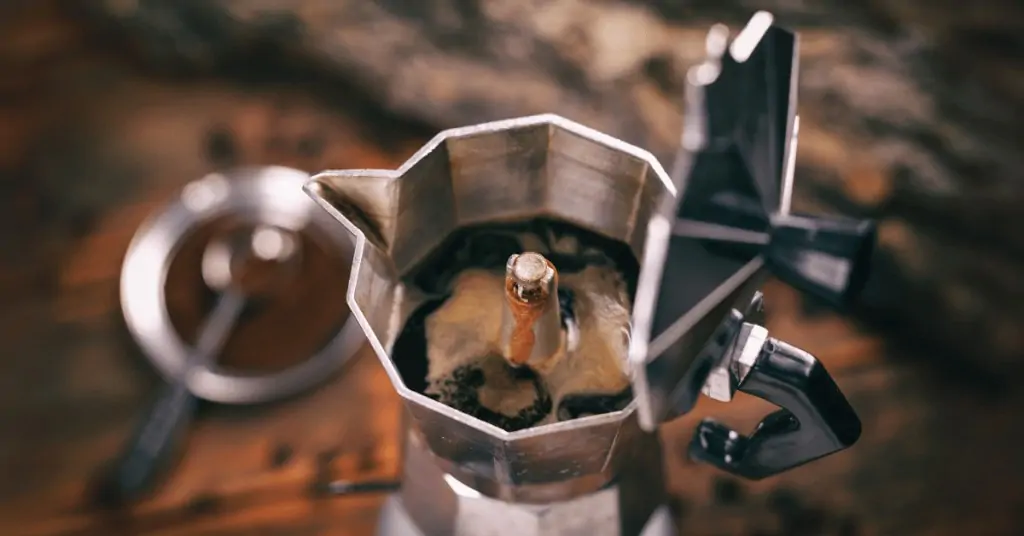 moka pot brewing coffee