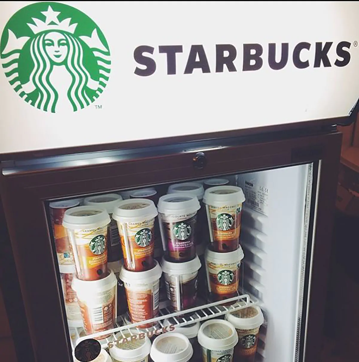 starbucks iced coffees in a fridge