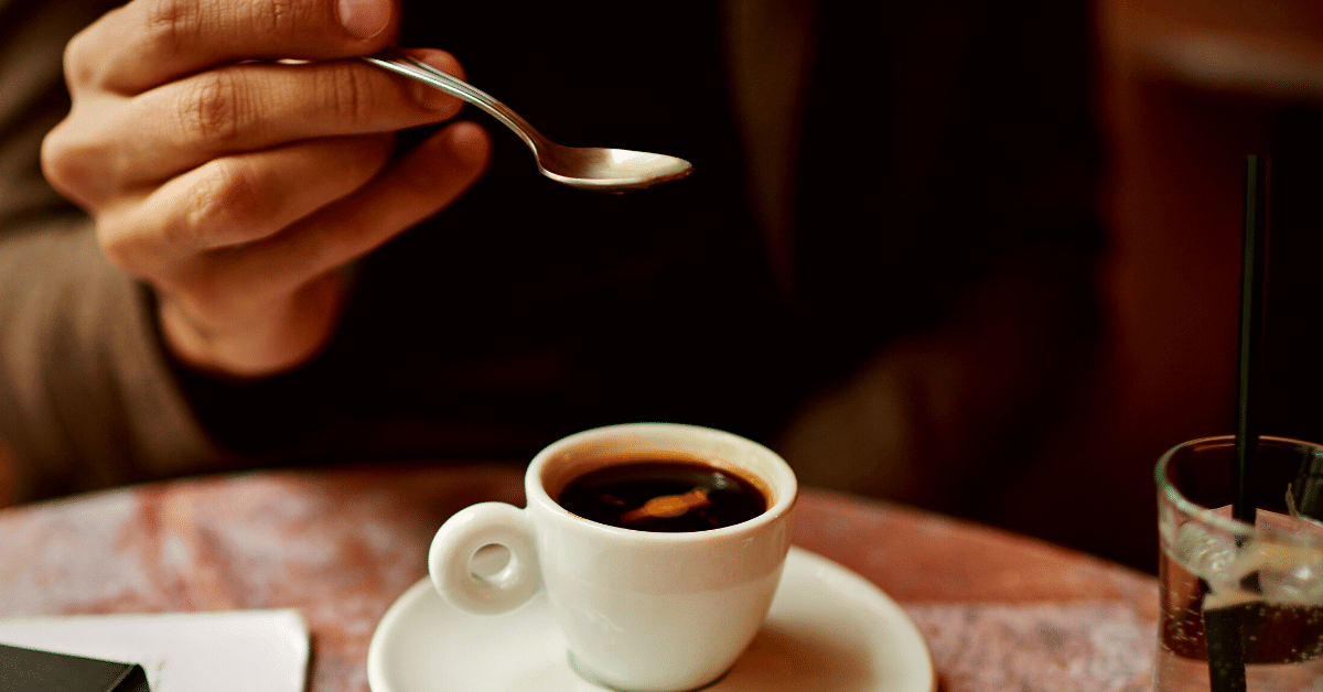 a person drinking coffee