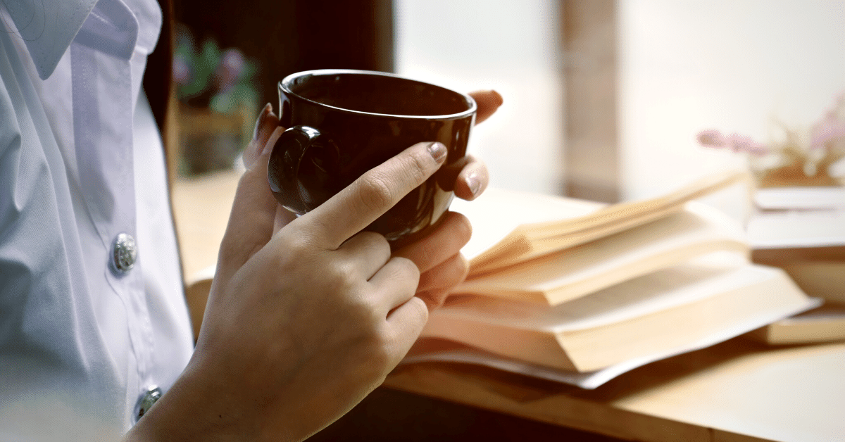 a woman drinking coffee