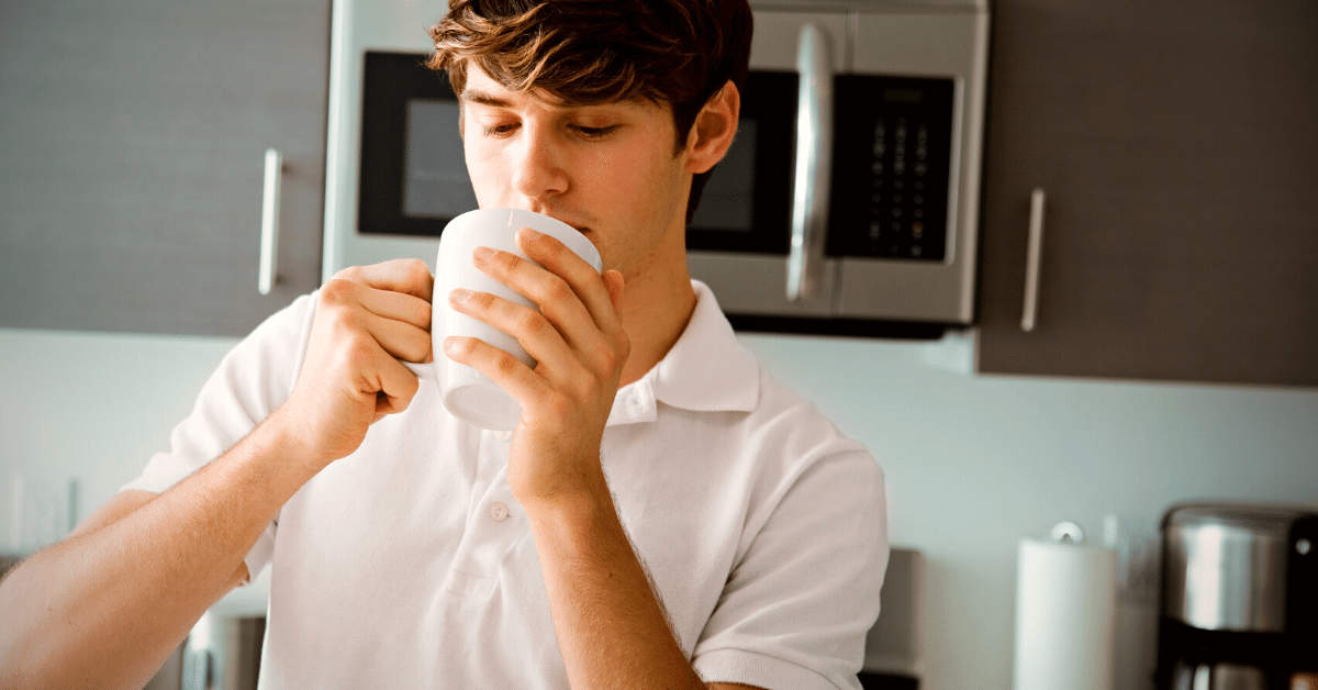 man drinking coffee