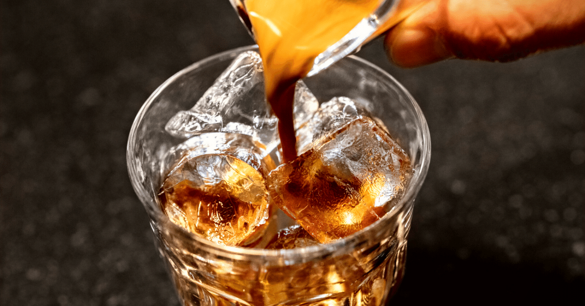 pouring coffee over ice