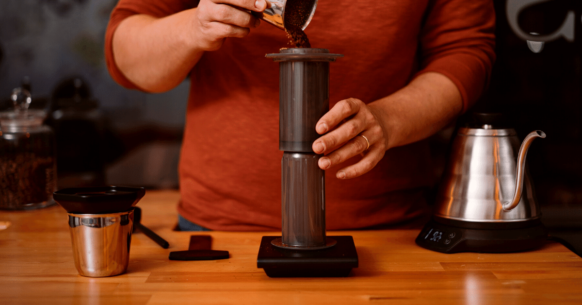 person using aeropress