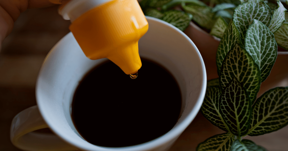 pouring honey into coffee